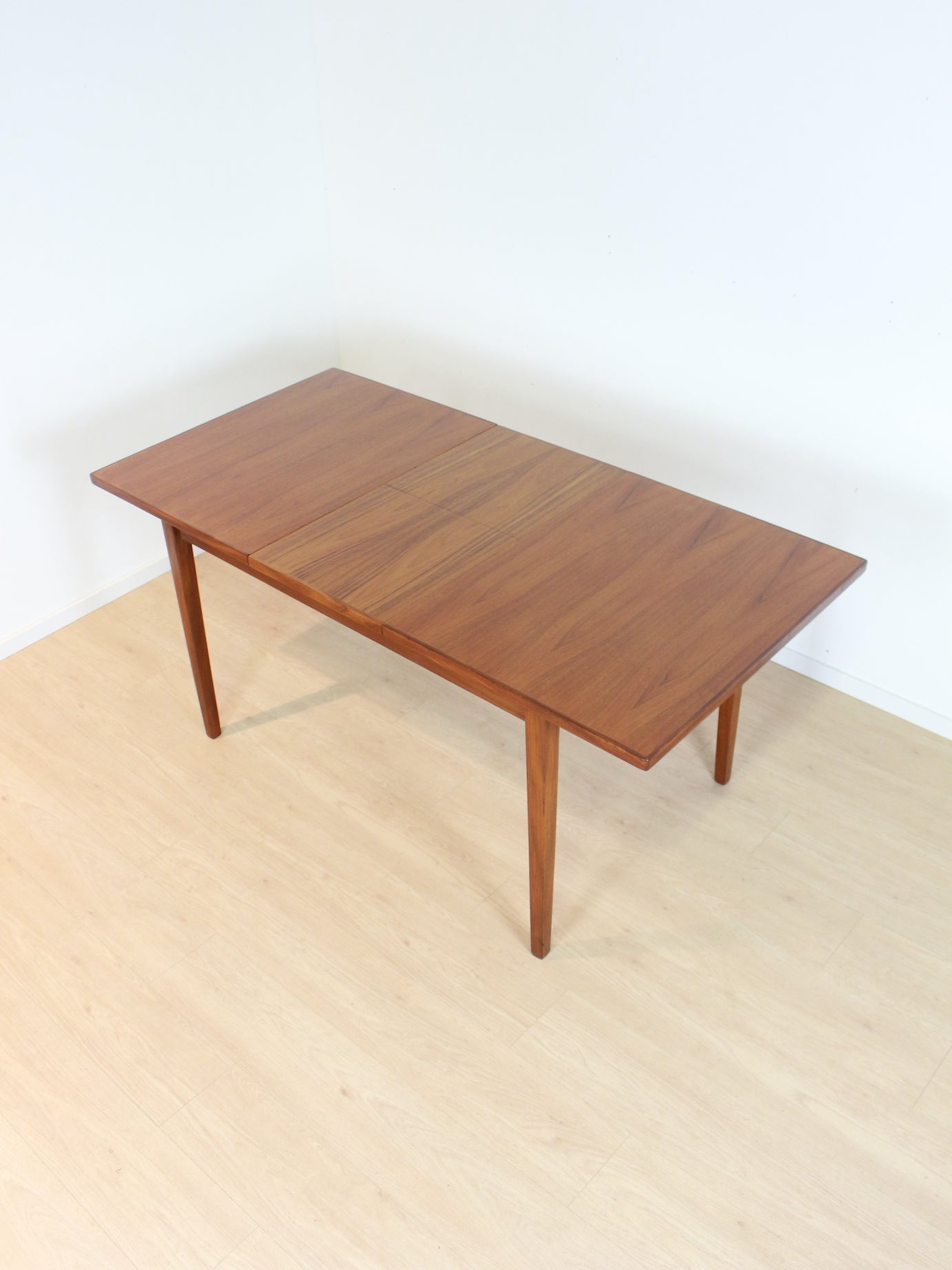 teak eettafel met tuimelblad