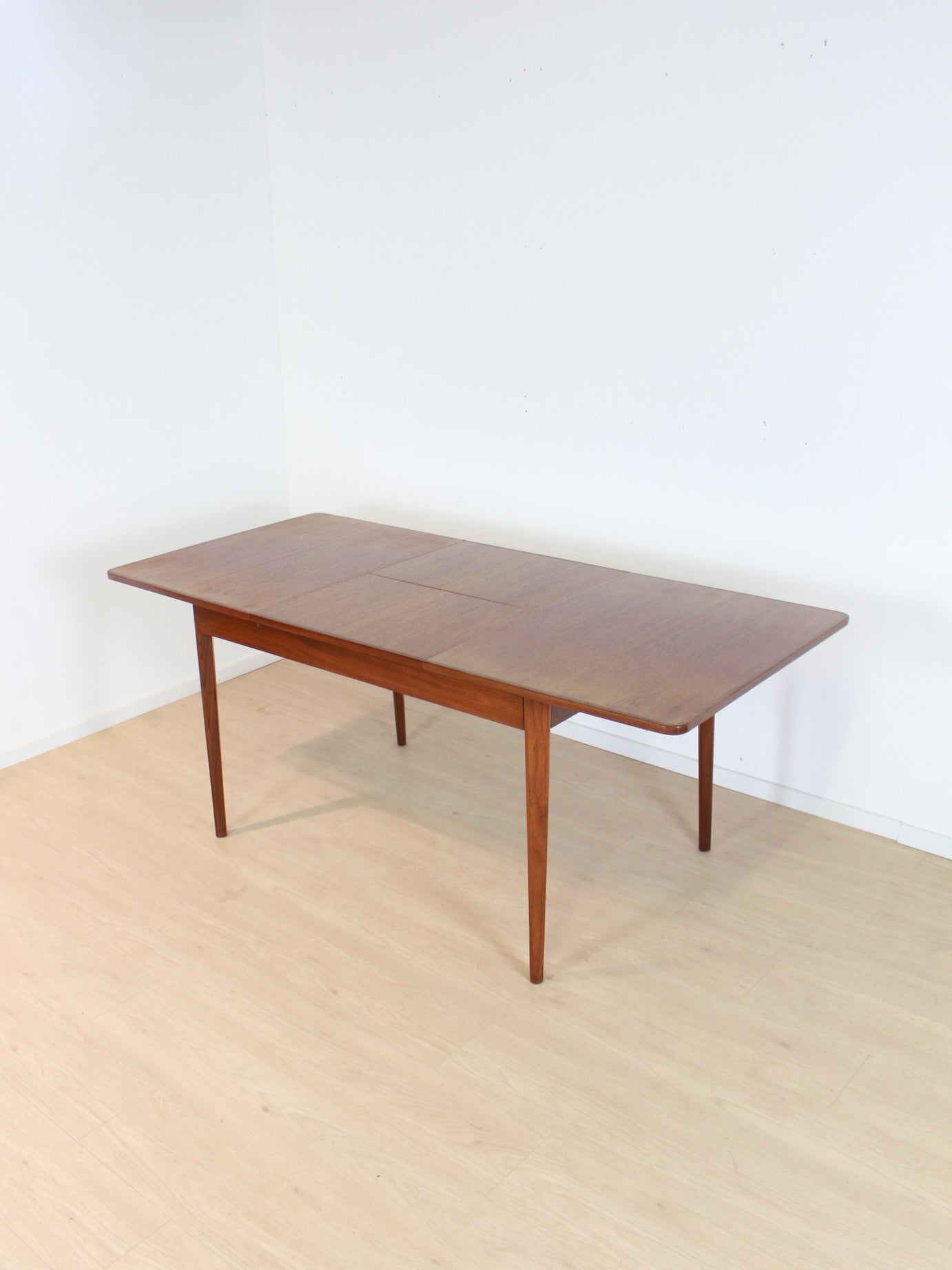 (Gereserveerd) Pastoe Eettafel met tuimelblad